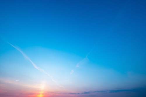 outdoors sunset with cloudy sky sky