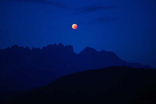 moon lunar eclipse with silhouette mountain eclipse