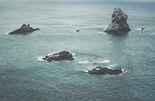 grey aerial view of body of water water