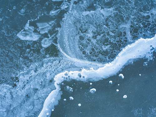 nature aerial view photography of seat waves land