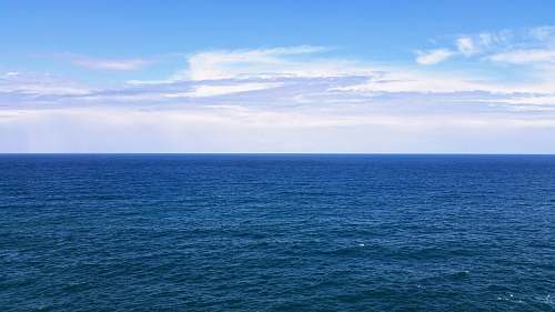 nature blue sea under blue sky and white clouds sky