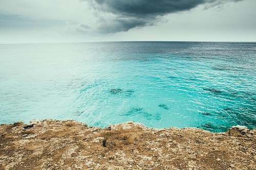 sea aerial view of body of water during daytime ocean