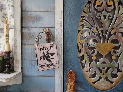 wood flying lessons signage witch