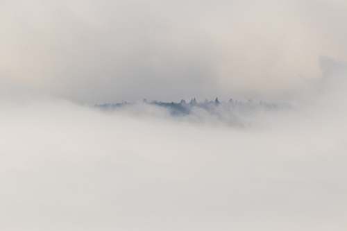 nature mountain covered with clouds fog