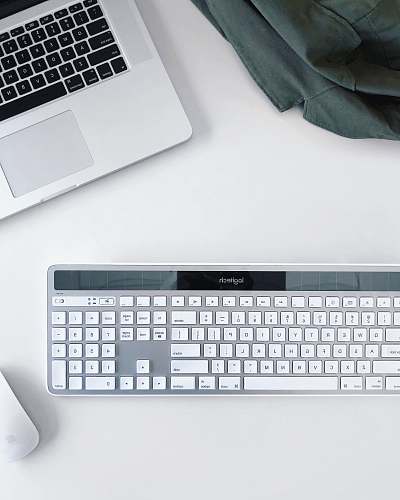 electronics gray computer keyboard placed on white surface laptop