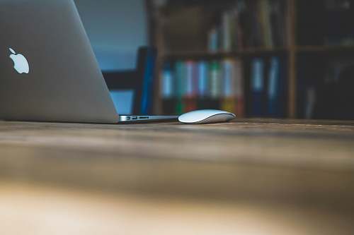computer Magic mouse on brown table electronics