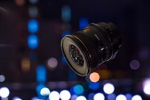 bokeh selective focus photography of camera lens equipment