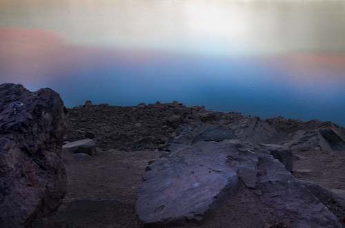outdoors gray rocks under gray sky embalse el yeso