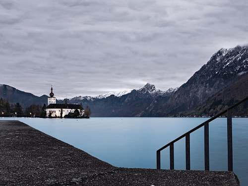 mountain landscape photograph of lighthouse alps