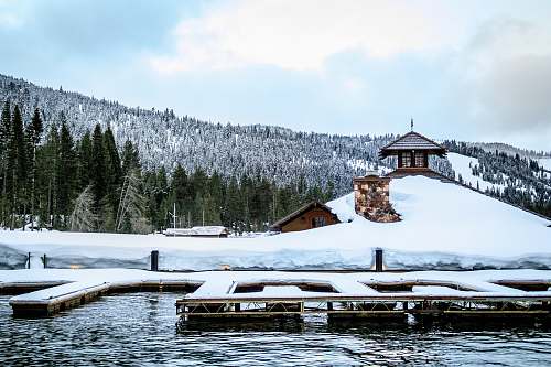 outdoors snow covered dock on the water water
