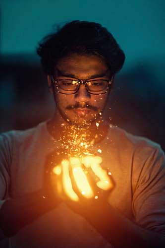people man holding lighted art human