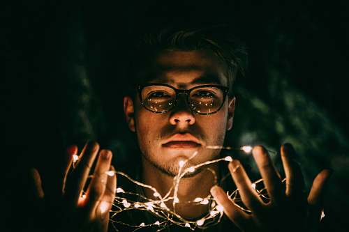 human man wearing black eyeglasses glasses