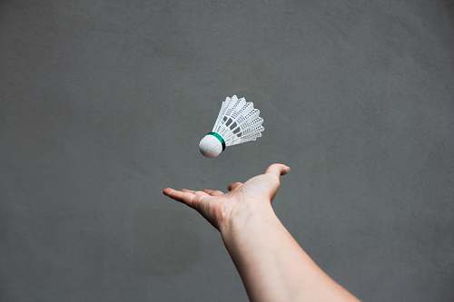 human white badminton shuttlecock sport