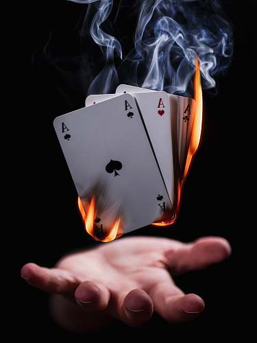 germany burning playing cards person