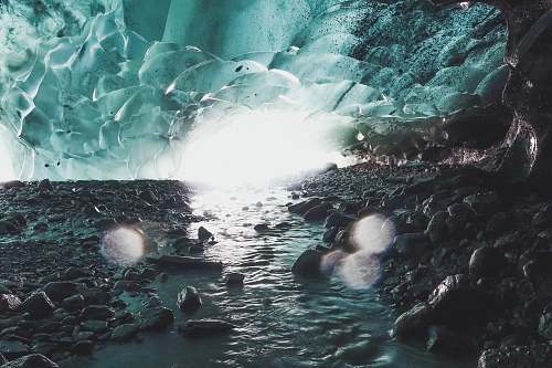 ice rock monolith and body of water digital wallpaper glacier