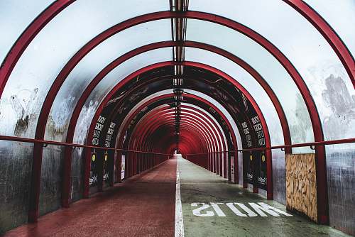 glasgow empty red and white glass tunnel building