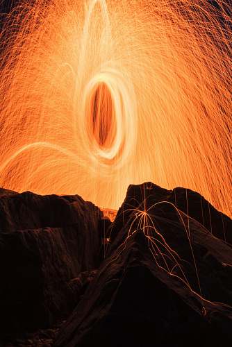 wallpapers steel-wool photography of brown rock formations wading river beach