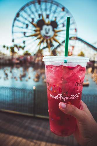 drink pink Disney Paris drink with green straw person