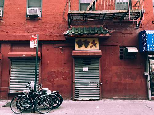 bike two gray gate shutters transportation