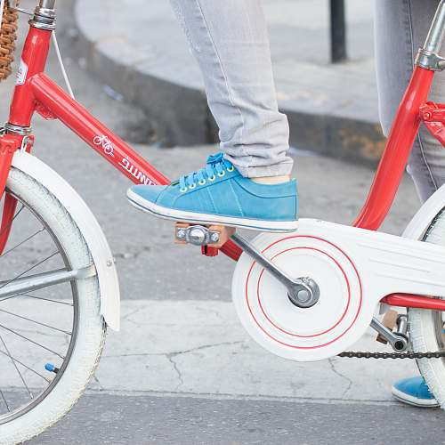 bicycle person riding red and white dutch bike salta