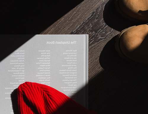 photography photo of The Unplash book on brown wooden surface table