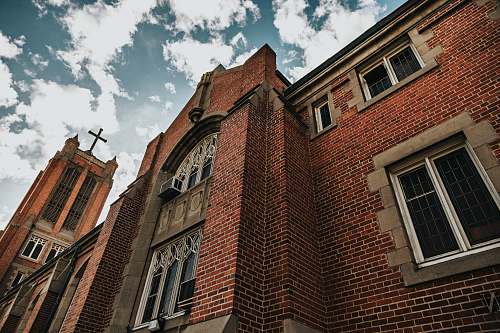 building brown brick building architecture