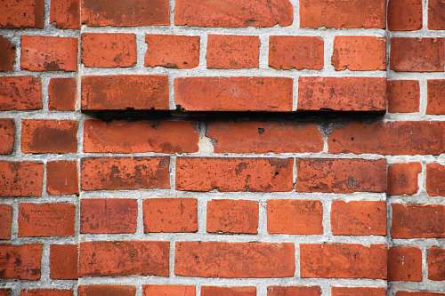 wall close-up photography of red bricks wall jahnstraße 9