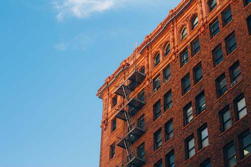 town brown concrete brick building during daytime urban