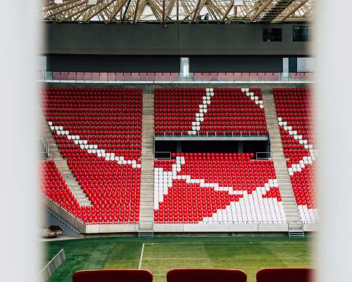 outdoors red and white stadium seats nature