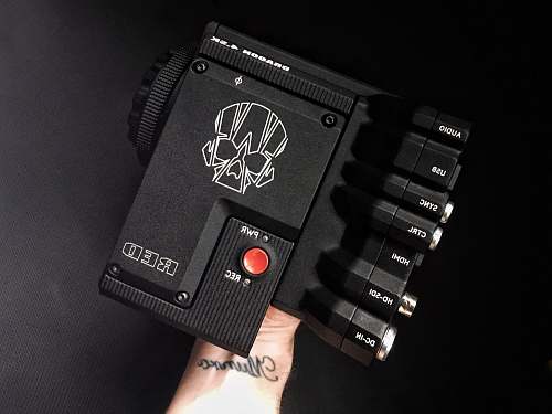 electronics black and gray amplfier holding