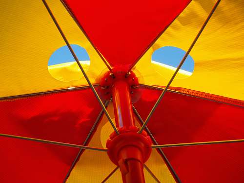 umbrella red and white parasol umbrella blue sky red yellow food