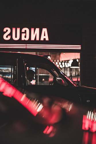 london man inside car taxi