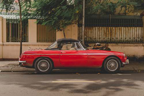 automobile red convertible coupe transportation