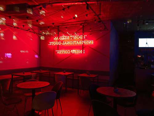 furniture shallow focus photo of red neon signage restaurant