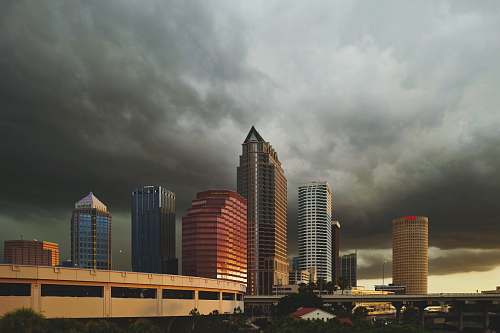 tampa wide angle photo of buildings under cumulus clouds building
