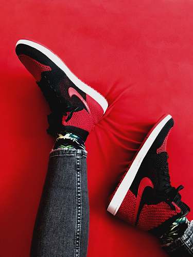 apparel person wearing Air Jordan 1 shoe s footwear