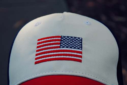 apparel white, red, and blue fitted cap hat