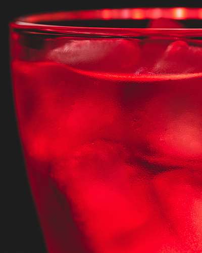 alcohol red-tinted glass cocktail
