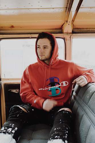 person man sitting on car seat people