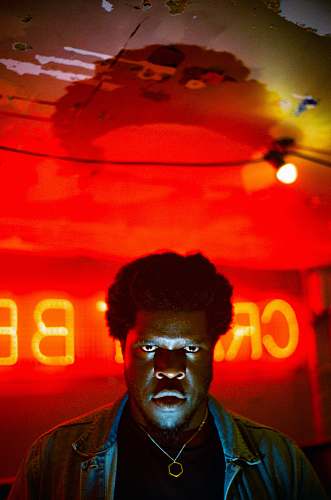 person man wearing black jacket light