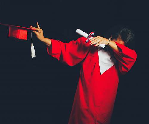 people person wearing red graduation dress person