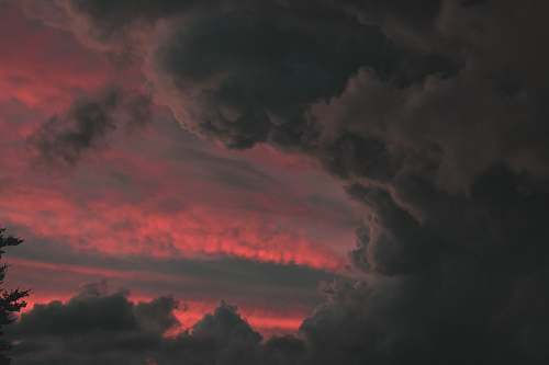 person time-lapse photography of gray clouds sky