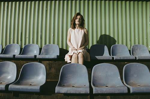 furniture woman sitting on gang chair chair