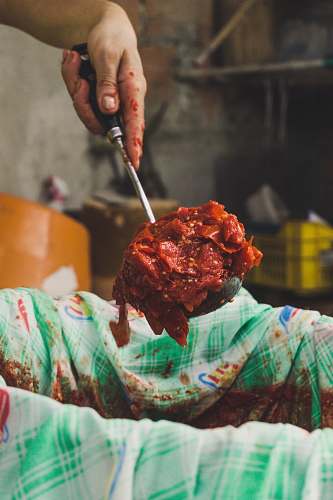 calabria person making a chili sauce bbq