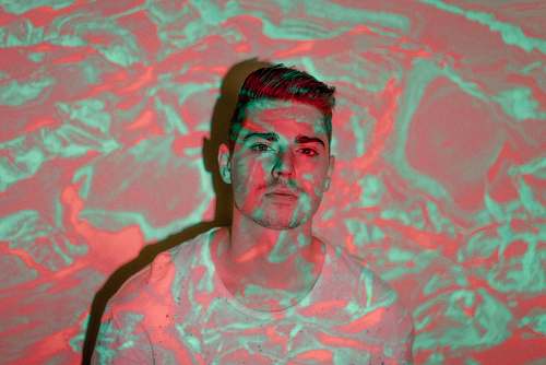 male man in white shirt lights