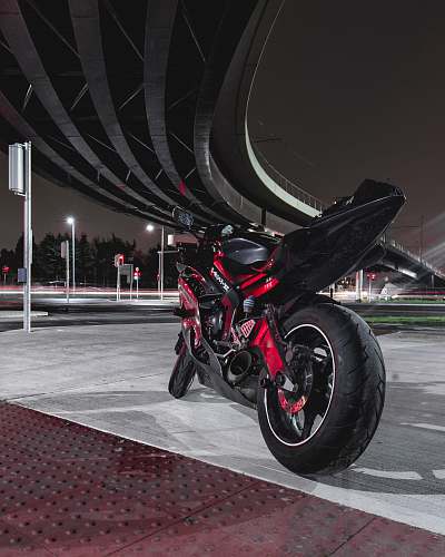 vehicle architectural photography of black bike and skyway transportation