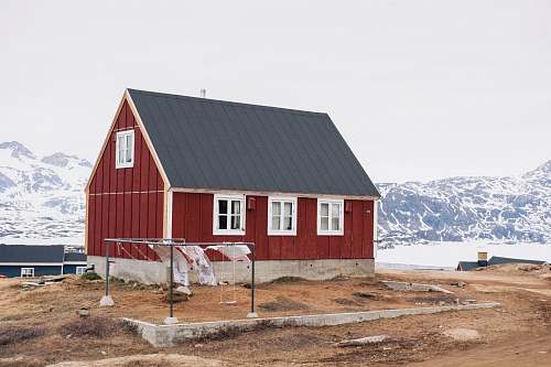 building photo of red and black house tasiilaq