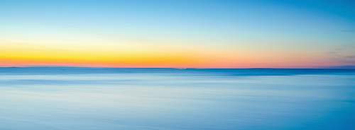 sunset body of water photo landscape