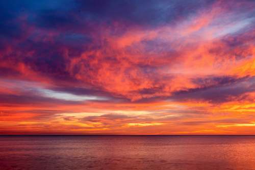 outdoors calm of sea during golden hour sunrise
