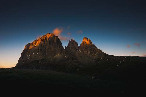 mountain mountain during sunset peak